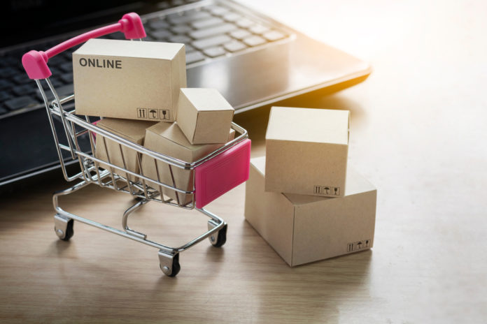 Paper,Shopping,Small,Box,Express,In,A,Shopping,Cart,And